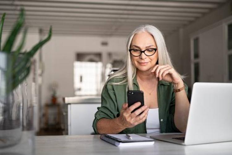 woman looking at her phone